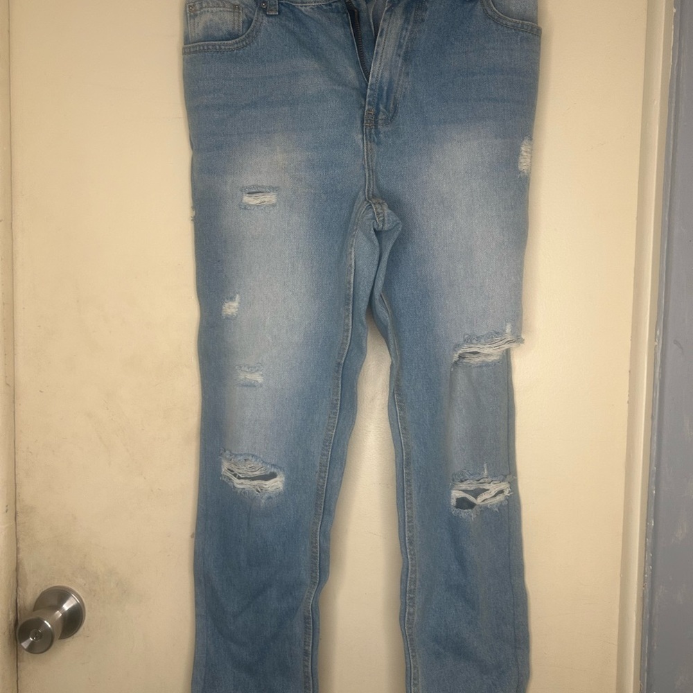 Women's Light Blue Distressed Jeans